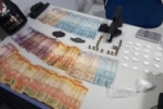 Traficante &eacute; flagrado com droga, dinheiro e arma na capital